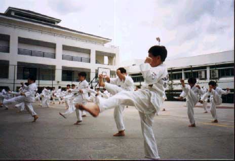 Primary School Students kicking